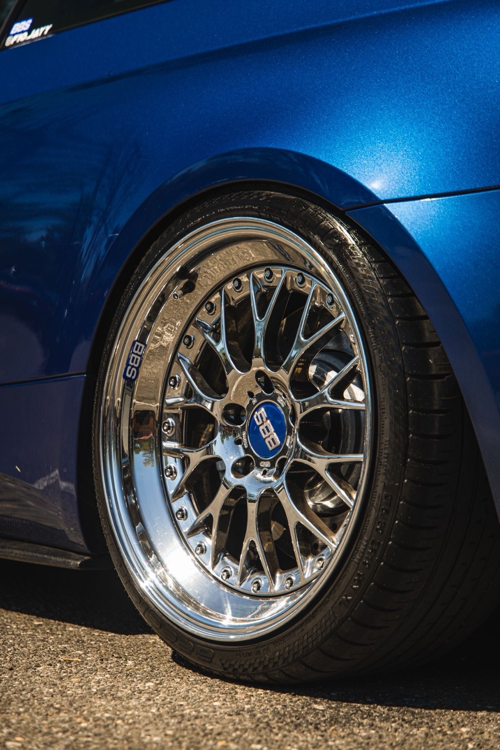 Blue BMW M3 parked at cars and coffee