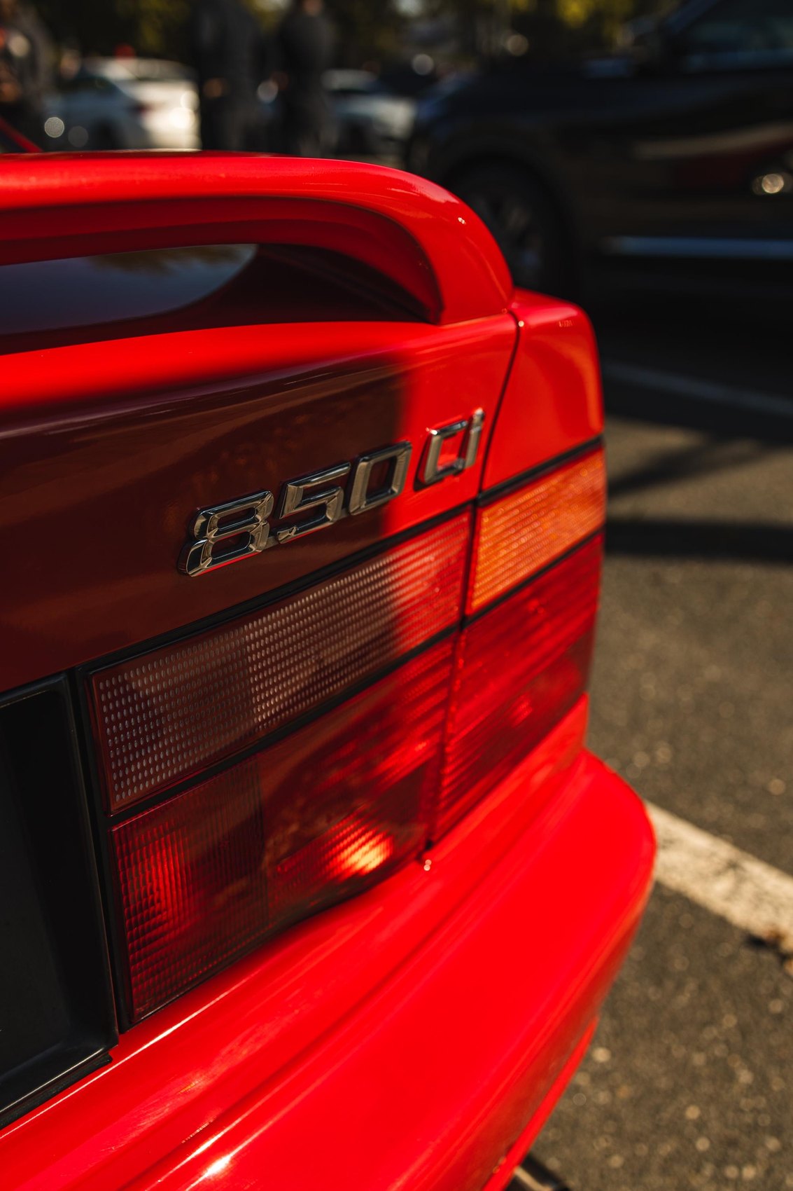 Red BMW 850Ci rear badge and taillight detail