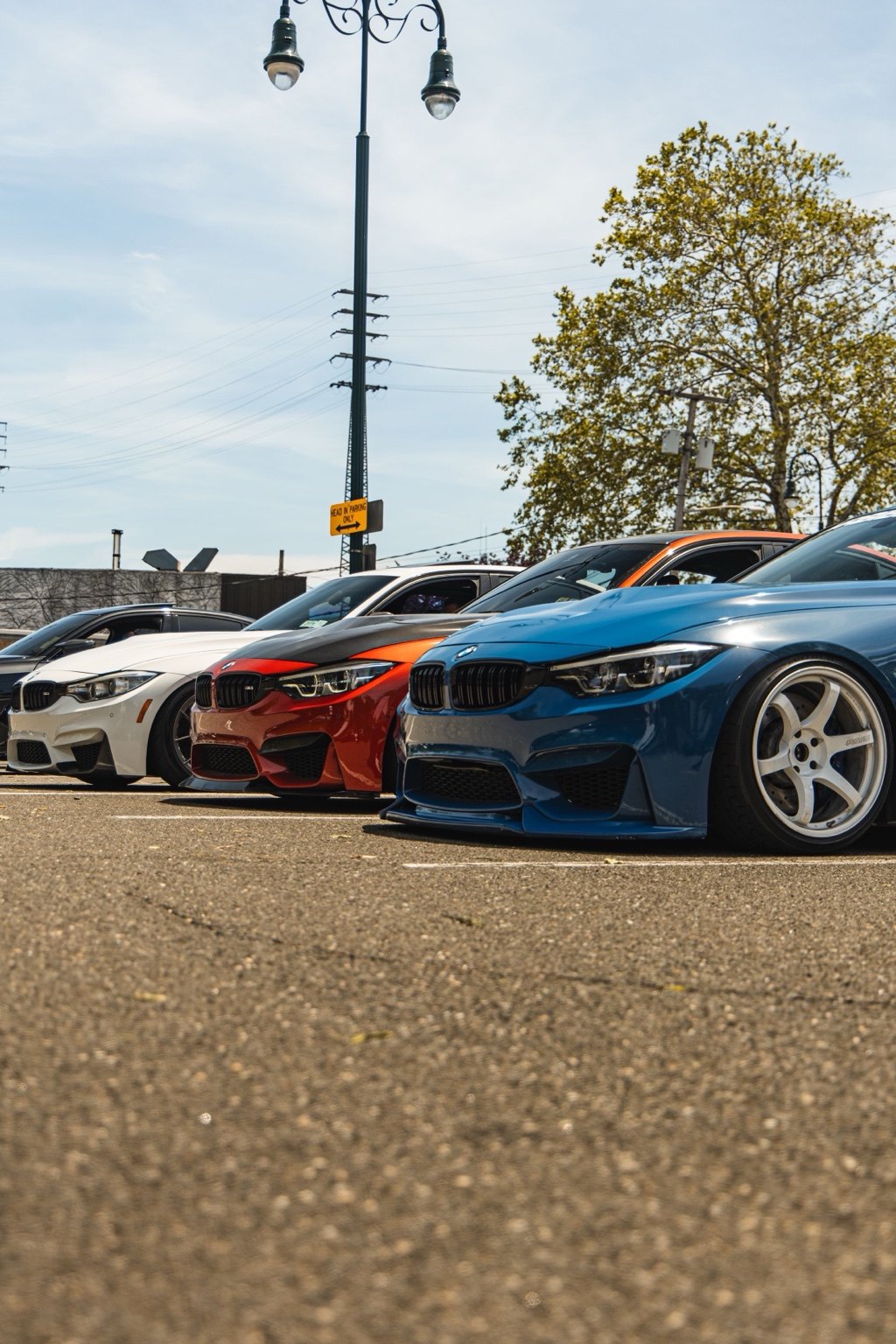 Lineup of BMW M cars at cars and coffee
